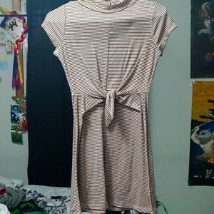 A pink and black striped dress